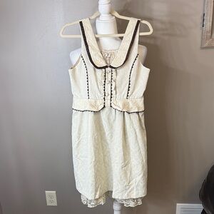 Elegant Cream Mini Dress with Brown Accents